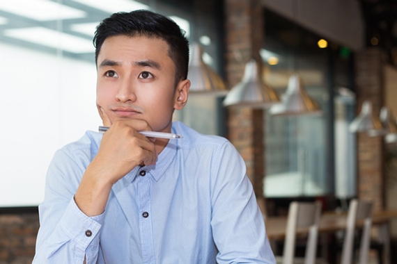 businessman considering studying MBA
